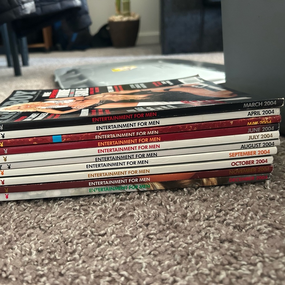 2004 PLAYBOY Magazine Stack with Red and Black Accents